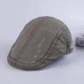 Detailed view of the dark grey cotton flat cap with stylish embroidery and texture. - Adjustable / Army Green