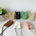 Mini PU leather crossbody bag, casual solid color phone purse with front card pocket for daily use - Black