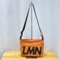 Trendy orange crossbody bag with bold LMN letters, waterproof pillow bag style for casual sports. - New Style Orange