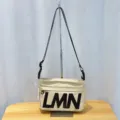 Canvas crossbody shoulder bag with bold LMN letters, casual waterproof pillow bag design. - New Style Off-White