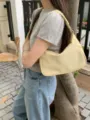 Casual minimalist yellow shoulder bag with braided strap, stylish hobo handbag for women daily. - Yellow