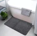 Soft flannel bath mat detail view with embossed pattern, non-slip backing for bathroom shower. - Diamond Pattern Dark Grey