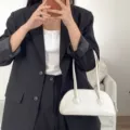 Minimalist white shoulder bag for women, versatile underarm baguette bag for daily style. - White