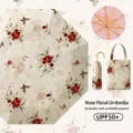 Paraguas plegable floral con protección UV, estructura dorada y bolsa a juego para mujeres. - Rose Chanson - Paraguas con revestimiento de color y mango dorado