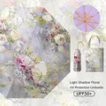 Paraguas plegable floral artístico con estructura dorada y protección solar UPF 50+. - Flores de luz y sombra: paraguas con revestimiento de color y gancho dorado