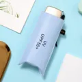 Compact folding umbrella with UV protection, portable mini sun umbrella in light blue. - Sky Blue
