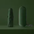 Compact dark green capsule mini umbrella with matching hard case for sun protection and rain. - Round 8-Rib Sun Umbrella, Dark Green (Full Blackout)