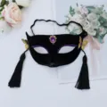 Black fox masquerade mask with purple rhinestones, gold butterflies, and long tassels for party. - Butterfly Tassel Mask (Purple Gem)