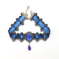 Gothic blue ribbon black lace choker necklace with faceted gemstone and crystal pendant. - Blue