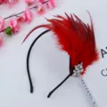 Red feather headband with rhinestones, perfect for party, carnival, and festival wear. - Red