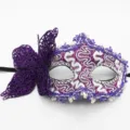 Purple lace masquerade mask with side bow, perfect for Halloween parties and Venetian balls. - One Size / Dragon Purple