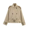 Detailed view of the short khaki trench coat collar, double-breasted buttons, and waist belt. - XS / Khaki
