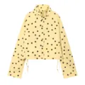 Veste jaune à pois noirs, col montant et manches longues, vue détaillée avec cordon de serrage. - XS / Hauts / Jaune