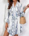Chic V-neck long sleeve dress with blue botanical print, featuring a stylish waist belt detail. - S / Dress (FY022) / Blue