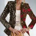 Elegant women's blazer featuring a chic leopard and rose print, lapel collar, and long sleeves. - XS / Tops / Leopard Print