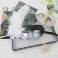 Black silver gradient half face masquerade mask with white feathers and side flower for party. - Silver