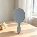 Specchio per trucco a mano blu macaron con manico ovale, specchietto cosmetico portatile. - Azzurro