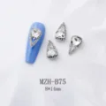Detailansicht japanischer Legierung klarer weißer ovaler Strass Nagelkunst Charms, 8x14mm Dekor. - Ovaler Unregelmäßiger Stil (B75) / 10er Pack