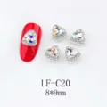 Detail view of triangular AB rhinestone nail art charms, sparkling glass crystal design. - Triangle Rhinestone (LF-C20) / 10 Pieces/Pack