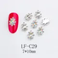 Detailed view of drop-shaped AB crystal nail rhinestones with alloy bases for stunning nail art designs. - Teardrop Aurora Rhinestone (LF-C29) / 10 Pieces/Pack