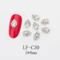 Detail shot of teardrop nail rhinestones featuring iridescent AB crystals and sparkling alloy trim. - Exquisite Inlaid Waterdrop Rhinestone (LF-C30) / 10 Pieces/Pack