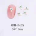 Vue détaillée de charms d'ongles étoile 3D avec strass bleus, décoration nail art en métal. - Breloque Étoile Alliage (B435)