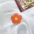 Cute orange flower phone grip holder, aesthetic acrylic mobile stand for daily phone use. - Orange Floral