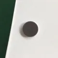 Solid color mobile phone grip holder, matte finish circular pop socket stand for desktop. - Charcoal Black
