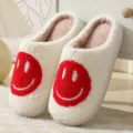 White fluffy winter slippers for couple with cute red smiley face design, warm indoor shoes. - Red