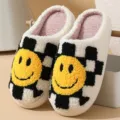 Cute plush slippers with black white checkerboard pattern and yellow smiley face design. - Plaid Smiley Face Black