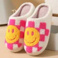 Plush cute winter couple slippers with pink checkerboard and yellow smiley face pattern. - Plaid Smiley Face Red