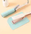 Set per acconciatura con ferro arricciacapelli, piastra e tappetini termici in silicone. - Verde