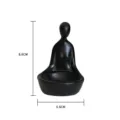 Portavelas resina abstracta minimalista estatuilla zen meditativa soporte vela negro decoración mesa - Candelabro de Mujer Sentada / Negro