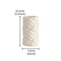 Detailed view of the modern ceramic vase with unique braided texture and compact size for decor. - M / White