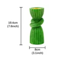 Resin aroma burner detail showcasing unique twisted shape and vibrant green glitter surface. - Sequin Curtain Knot Incense Burner - Green