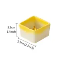 Detail view of mini square ceramic incense holder with yellow gradient and golden center decor. - Square Deep Dish Gourd Incense Holder / Yellow
