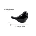 Detail view of the black ceramic bird figurine, showing smooth glaze and precise dimensions. - L / Black