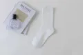 White ribbed mid-calf socks for women, minimalist daily casual knit hosiery style. - Female Style / White
