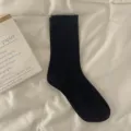 Classic solid black long socks for women, soft comfortable casual daily wear basic stockings. - One Size / Black