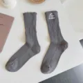 Grey distressed high tube socks with embroidery, cozy medium thick stack socks for women. - One Size / Dark Gray