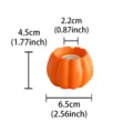 Resin pumpkin candle holder detail view, Halloween harvest tabletop home decor and ornament. - Orange