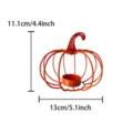 Orange metal pumpkin candle holder detail view, iron art decorative harvest festival prop. - Iron Wire Pumpkin Candle Holder / Orange