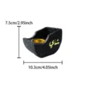 Detail view of creative resin boat-shaped incense burner with Arabic calligraphy and gold inner dish. - Boat Shape Gold Lettering Incense Burner (S) / Black