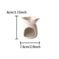 Ceramic aromatherapy candle holder detail, white heart-shaped design, compact size showcase. - Leaf Top Aromatherapy Burner / White