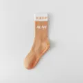 Orange white mid-calf yoga grip socks, anti-slip silicone athletic socks for women fitness. - One Size / Orange