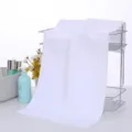 White thick soft absorbent towel for beauty salon hotel bath, comfortable skin care essential. - White