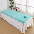 Thickened microfiber beauty salon massage bed cover featuring face hole and quilted skirt. - Sky Blue