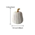 Detailed shot of the white ceramic pumpkin figurine with a shiny gold stem, size reference display. - Fine-Petal Pumpkins with Golden Stem - White