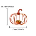 Metal pumpkin candle holder with gold insert cup, orange wireframe design for autumn decor. - Iron Wire Pumpkin Incense Burner / Orange