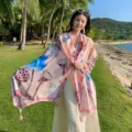Detailed view of vintage ethnic style floral print beach shawl and scarf in outdoor scene. - Style 2321
